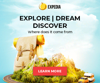 Backpack and camper van on a mountain path with an explore dream discover headline