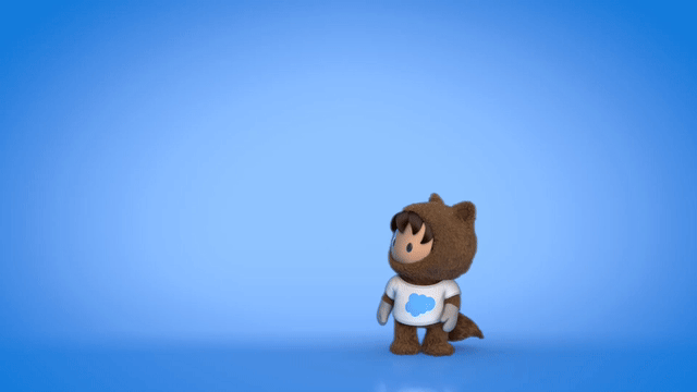 Animated Salesforce Astro mascot character standing on a blue background